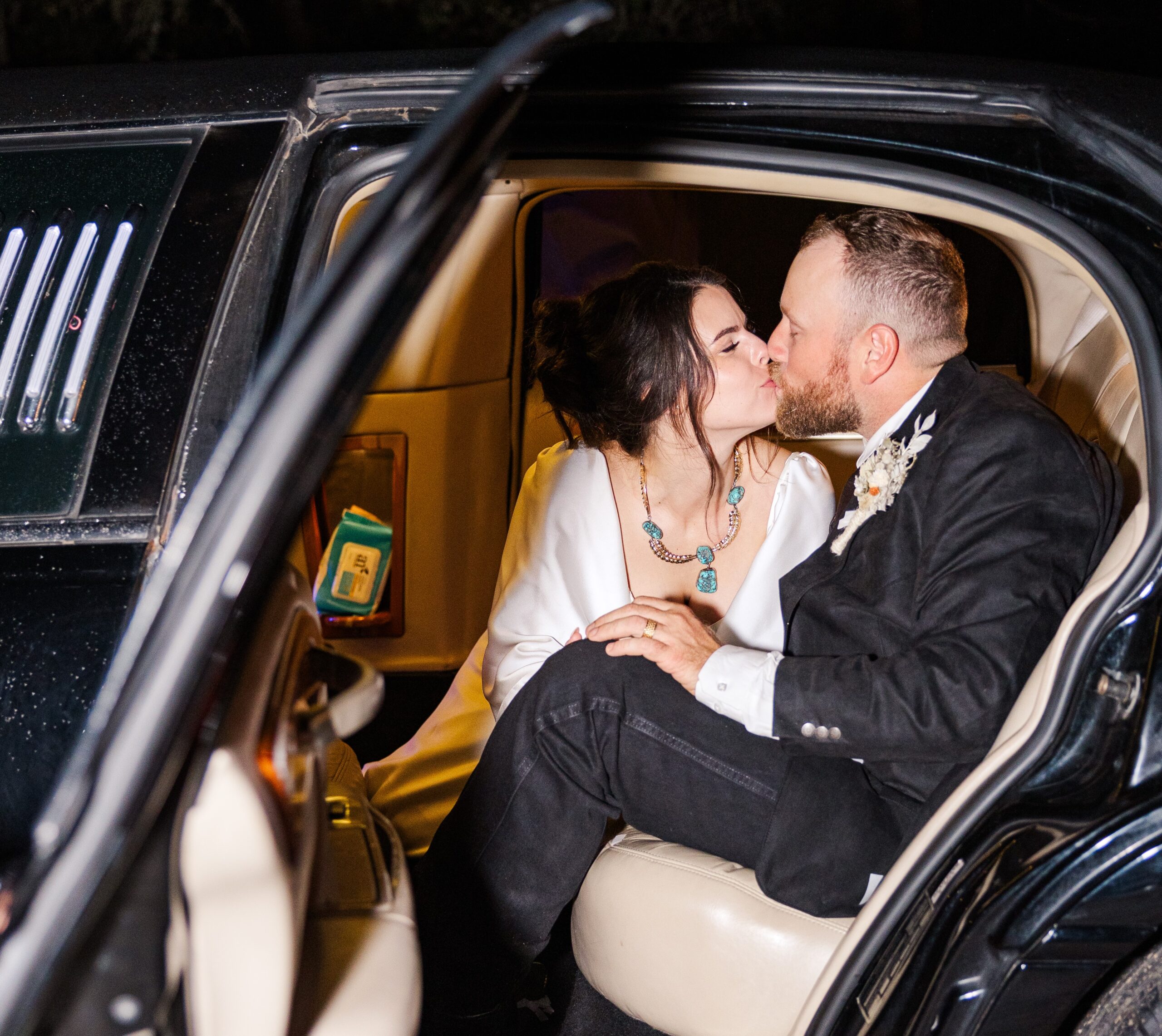 San Antonio bride and groom in car to get away during their wedding night